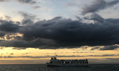 Grey-Clouds-on-FI-bay-with-Ferry
