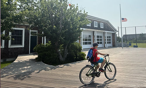  Bike-rider-in-front-of-Saltaire-Fire-House