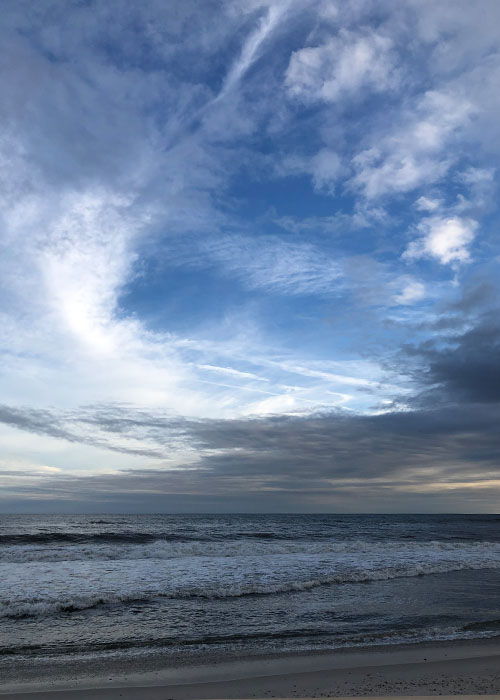 Grey wispy clouds Over Fire Island Beach